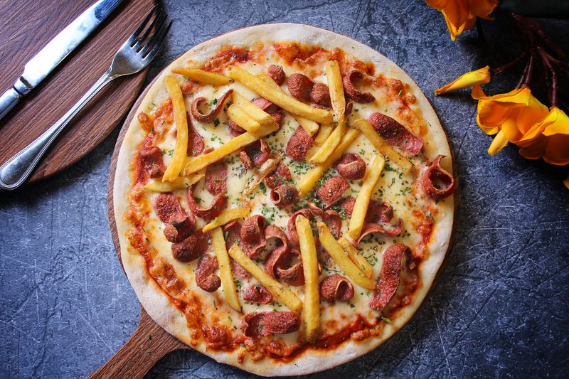 Handcrafted pizza at a wedding catering event