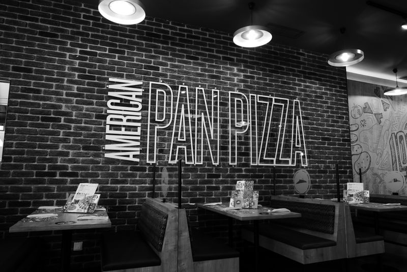 Dewey's pizza wood-fired oven with authentic Italian pizza craft